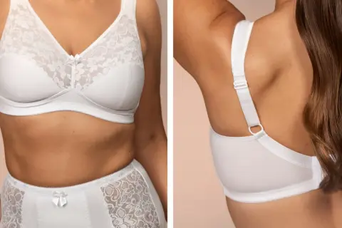 Biały biustonosz z koronkowymi miseczkami i ozdobną kokardką. Idealny dla kobiet szukających komfortu i elegancji. Jaki to rozmiar? 80D.