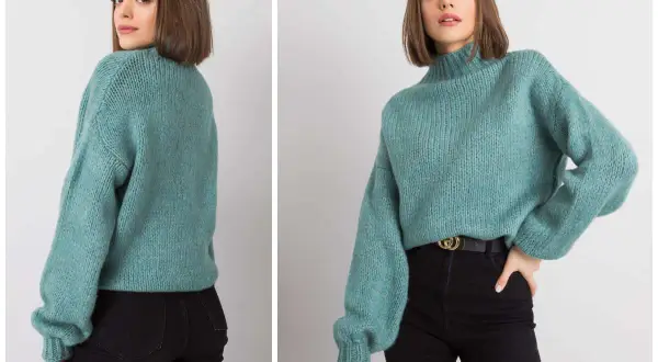 Dziewczyna w turkusowym swetrze, który jest idealnym wyborem na chłodniejsze dni. Ten sweter czy sweter to must-have w każdej szafie.